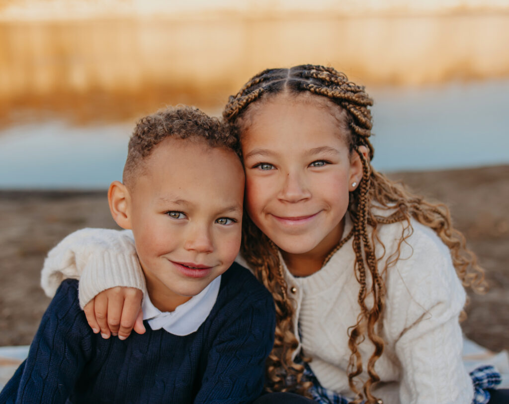 kids pose for fall edmonton family photos in the river valley