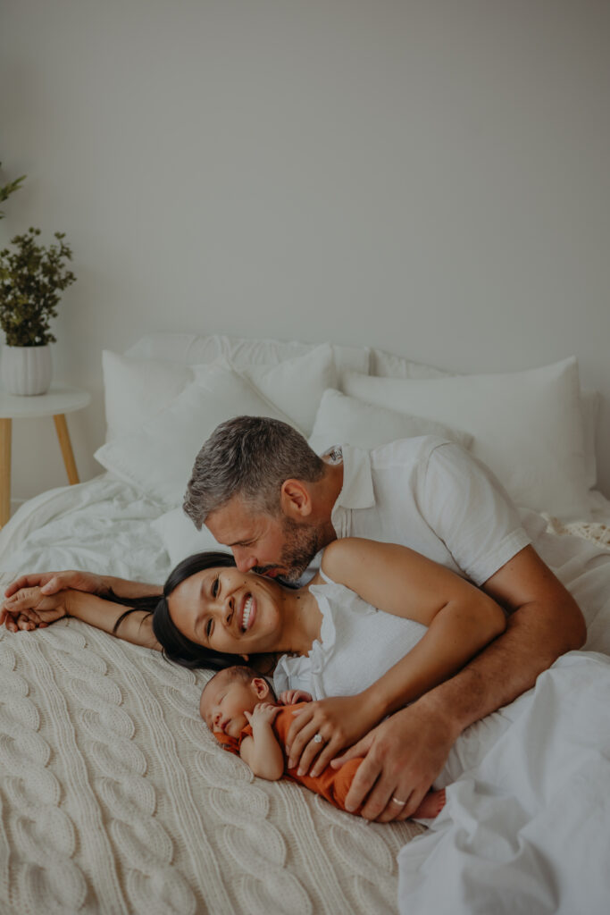 edmonton family poses for newborn photos
